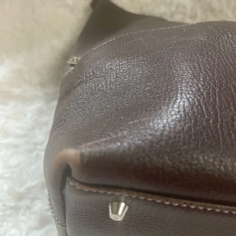 Maxx New York Leather Brown medium shoulder bag with silver tone hardwares.